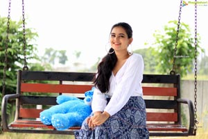 Vaanya Aggarwal in Blue Printed Maxi Skirt and White Top