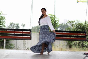 Vaanya Aggarwal in Blue Printed Maxi Skirt and White Top