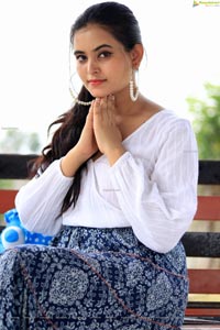 Vaanya Aggarwal in Blue Printed Maxi Skirt and White Top