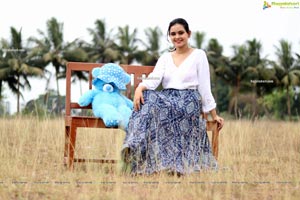 Vaanya Aggarwal in Blue Printed Maxi Skirt and White Top