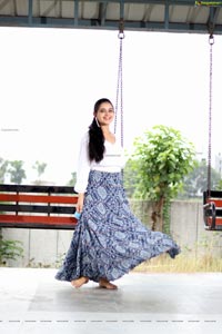 Vaanya Aggarwal in Blue Printed Maxi Skirt and White Top