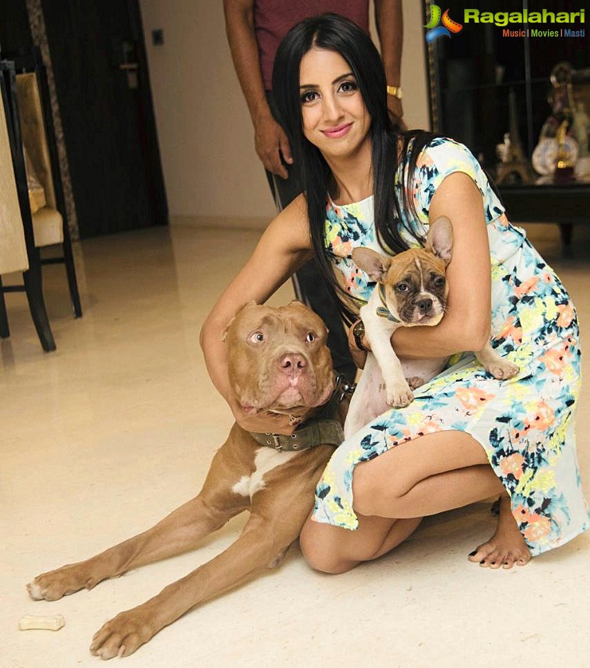 Sanjjanaa Galrani Poses With Her Pet Dog