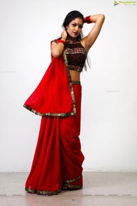 Hot Meghana Raj in Red Saree