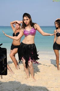 Tamanna Hot Rebel Beach Song Photos
