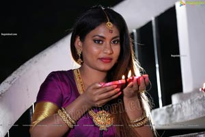 Priya Augustin Holding Diya