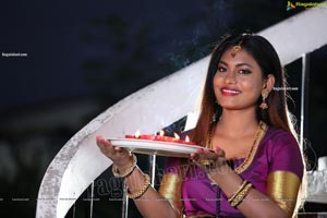 Priya Augustin Holding Diya