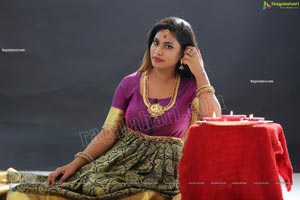 Priya Augustin Holding Diya