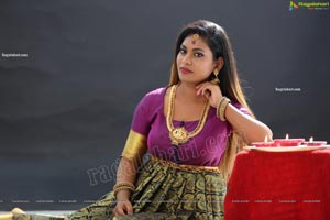 Priya Augustin Holding Diya