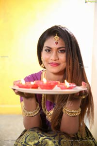 Priya Augustin Holding Diya