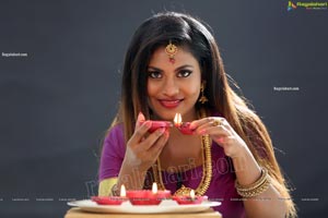 Priya Augustin Holding Diya