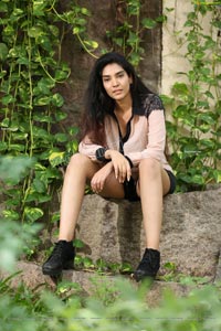 Supraja Narayan in Pastel Pink Shirt and Black Shorts