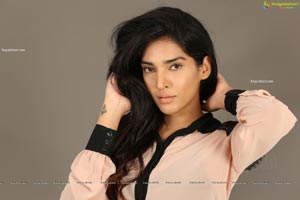 Supraja Narayan in Pastel Pink Shirt and Black Shorts