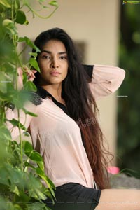 Supraja Narayan in Pastel Pink Shirt and Black Shorts