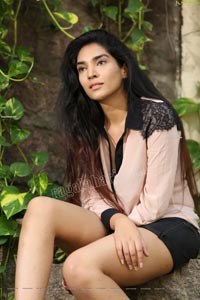 Supraja Narayan in Pastel Pink Shirt and Black Shorts