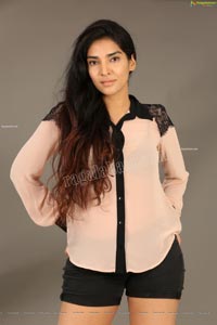 Supraja Narayan in Pastel Pink Shirt and Black Shorts