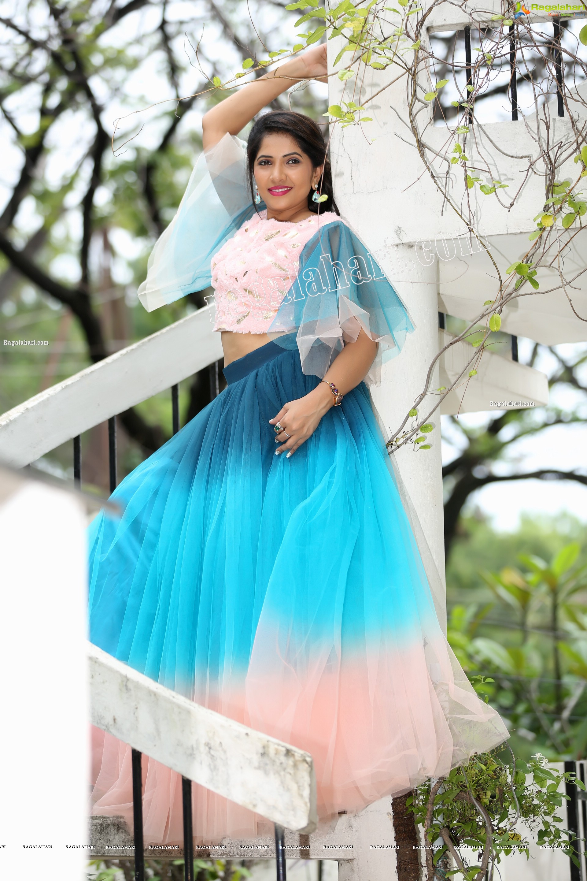 Indu in Bell Sleeves Pink Crop Top and Sky Blue Net Lehenga Exclusive Photo Shoot