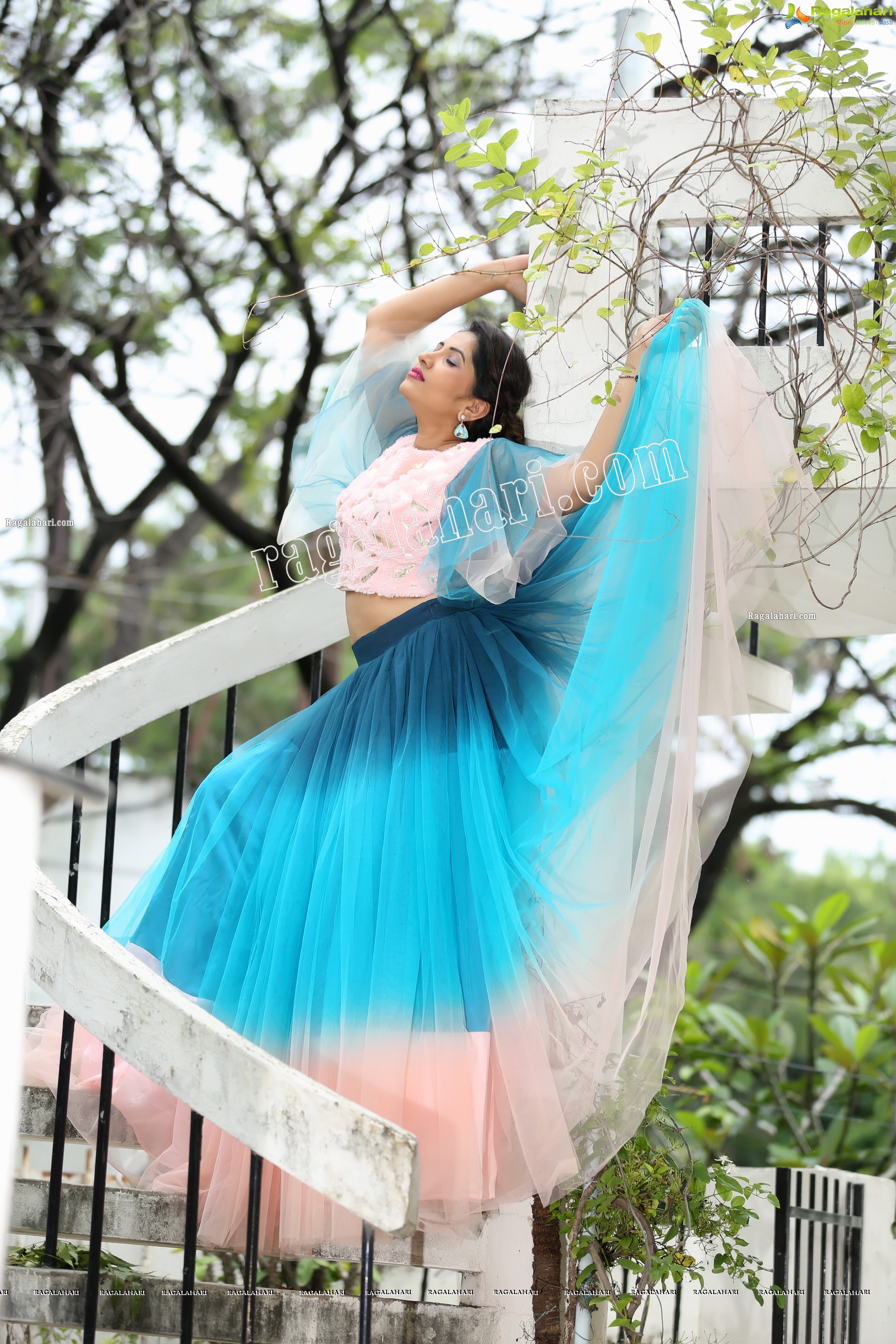 Indu in Bell Sleeves Pink Crop Top and Sky Blue Net Lehenga Exclusive Photo Shoot