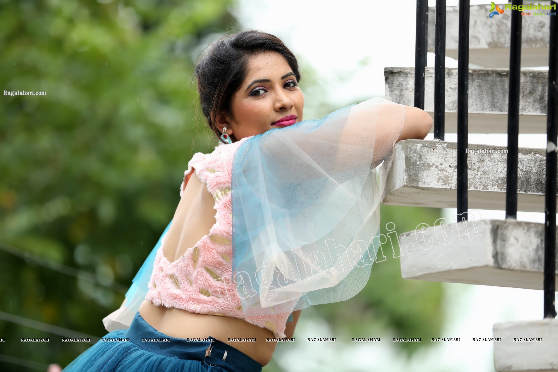 Indu in Bell Sleeves Pink Crop Top and Sky Blue Net Lehenga Exclusive Photo Shoot