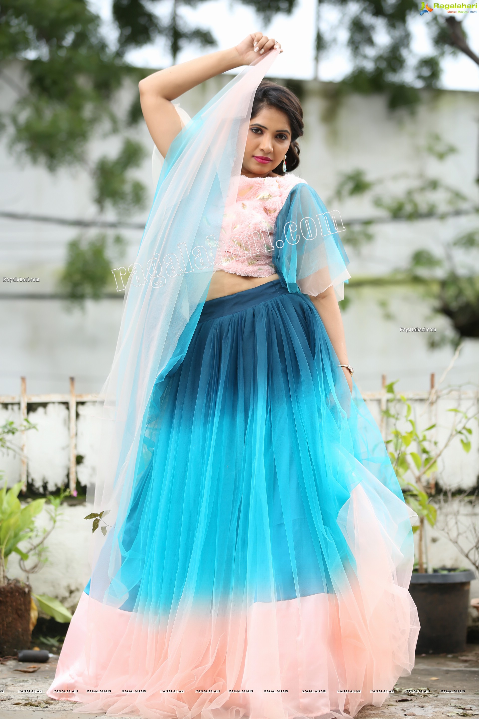 Indu in Bell Sleeves Pink Crop Top and Sky Blue Net Lehenga Exclusive Photo Shoot