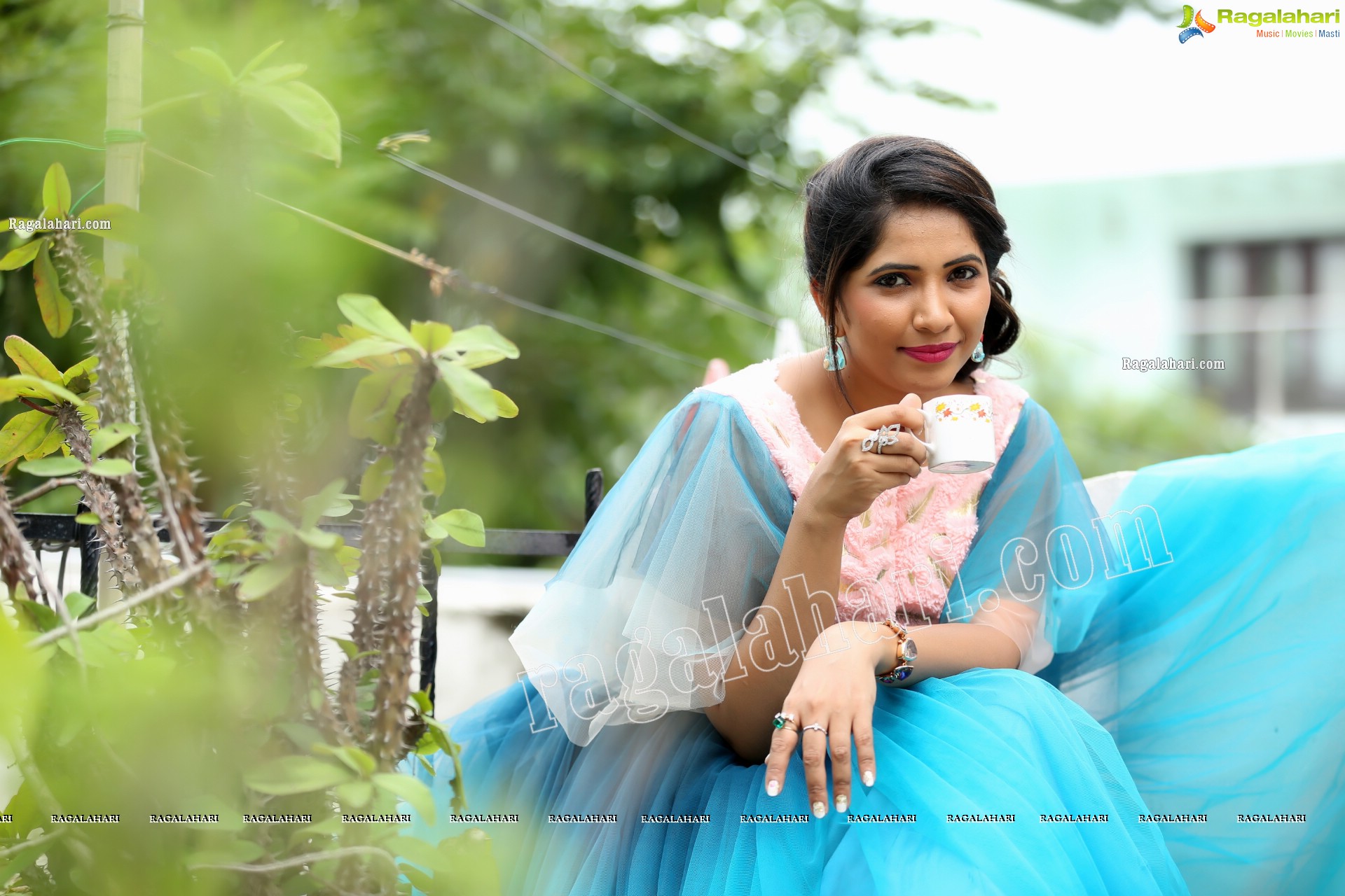 Indu in Bell Sleeves Pink Crop Top and Sky Blue Net Lehenga Exclusive Photo Shoot