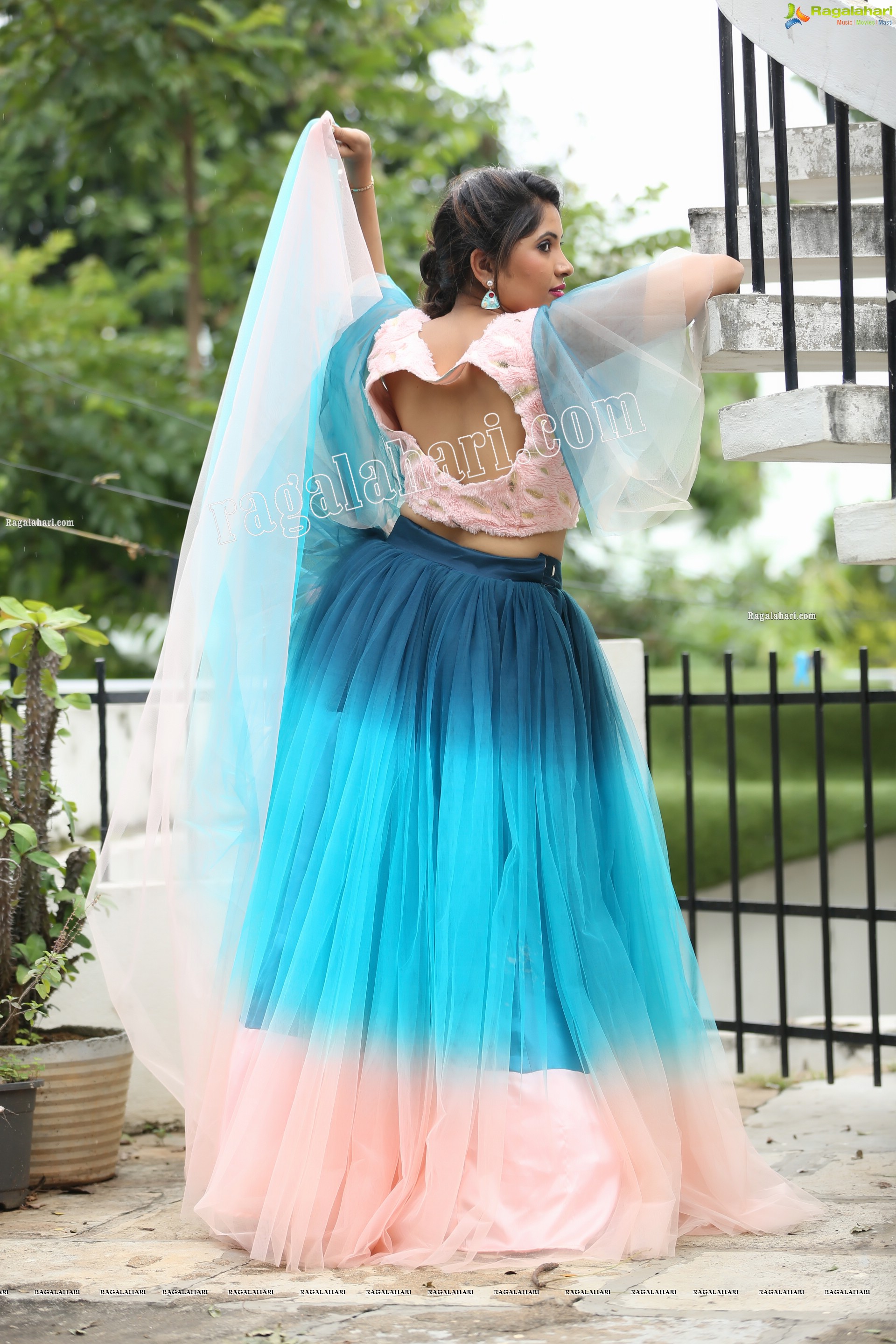 Indu in Bell Sleeves Pink Crop Top and Sky Blue Net Lehenga Exclusive Photo Shoot