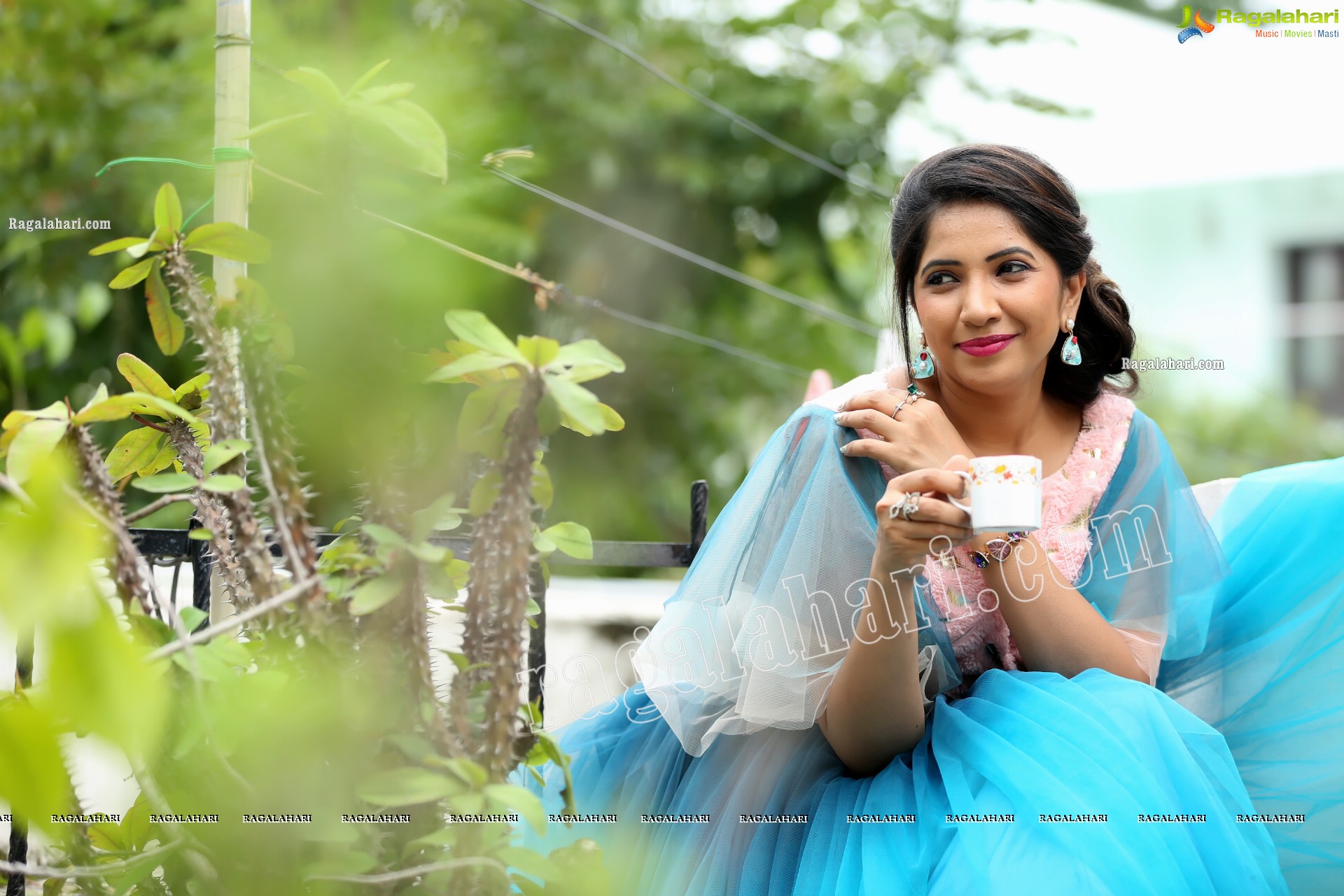 Indu in Bell Sleeves Pink Crop Top and Sky Blue Net Lehenga Exclusive Photo Shoot