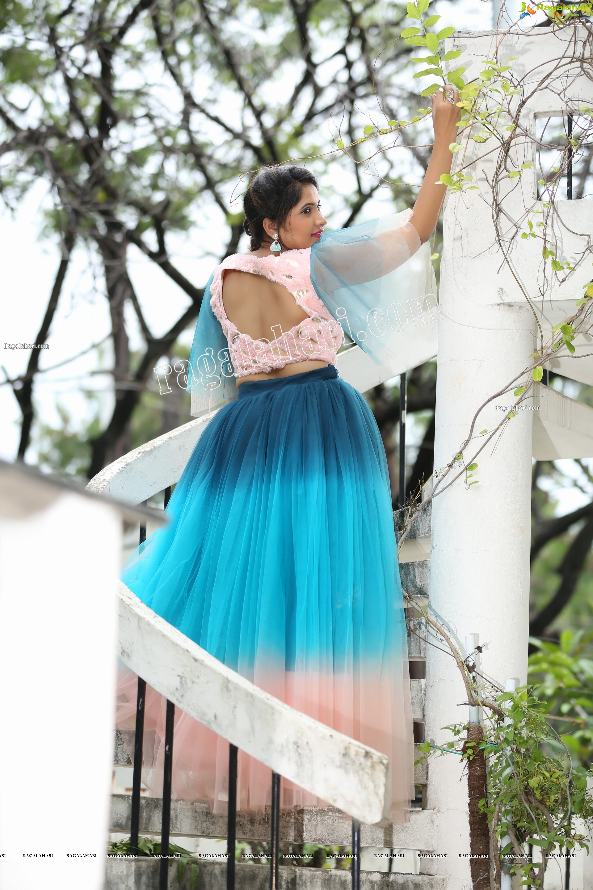 Indu in Bell Sleeves Pink Crop Top and Sky Blue Net Lehenga Exclusive Photo Shoot