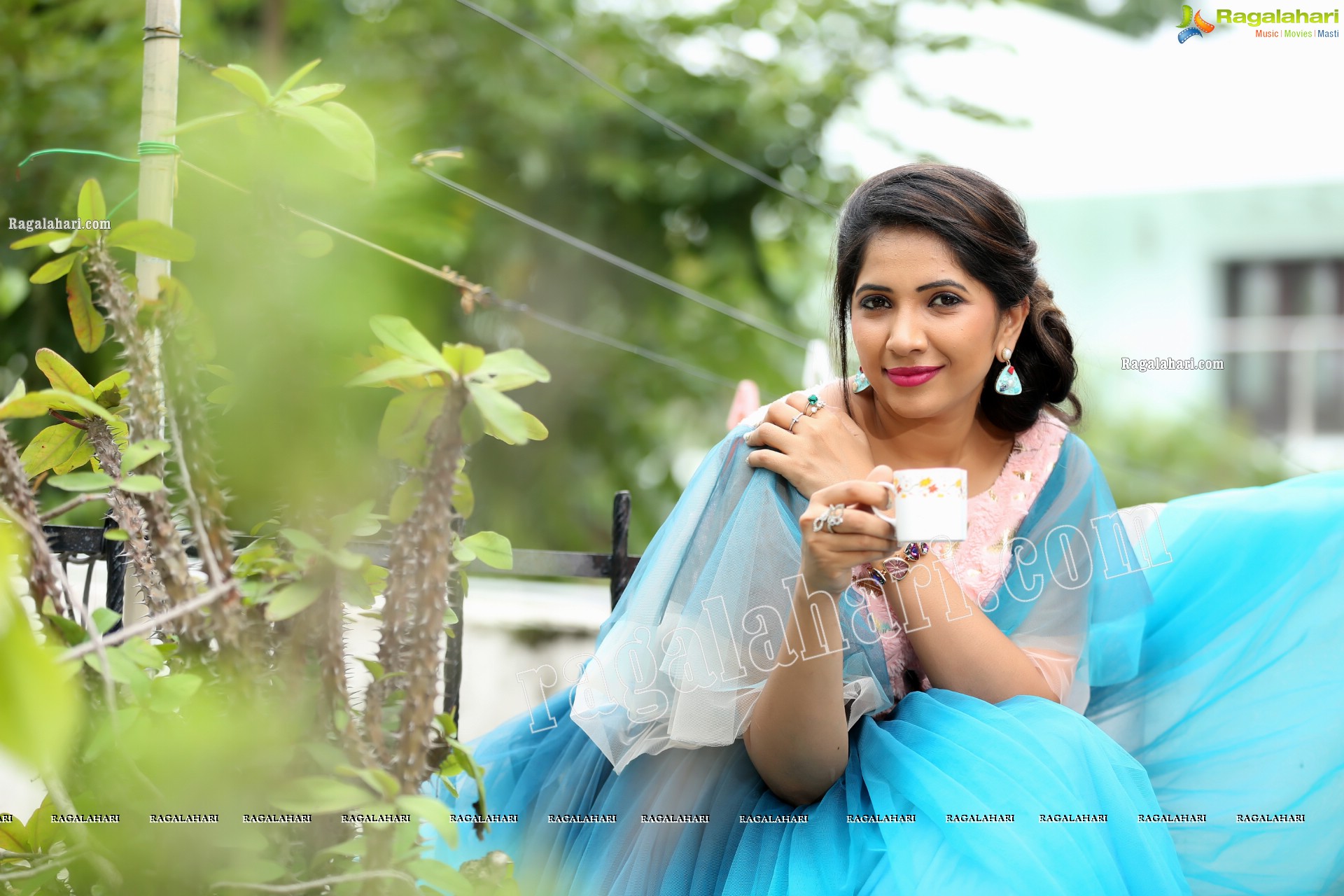 Indu in Bell Sleeves Pink Crop Top and Sky Blue Net Lehenga Exclusive Photo Shoot