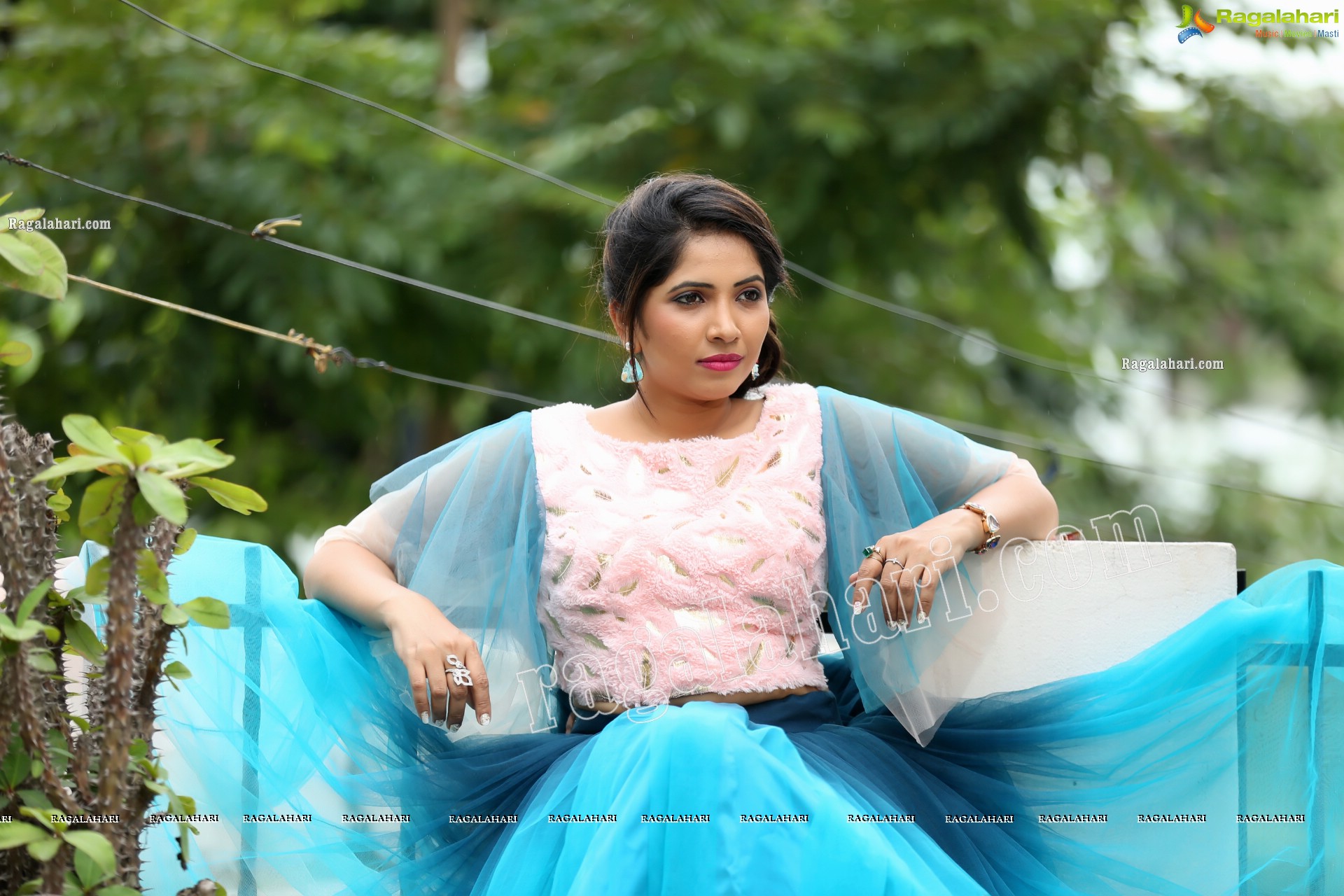 Indu in Bell Sleeves Pink Crop Top and Sky Blue Net Lehenga Exclusive Photo Shoot