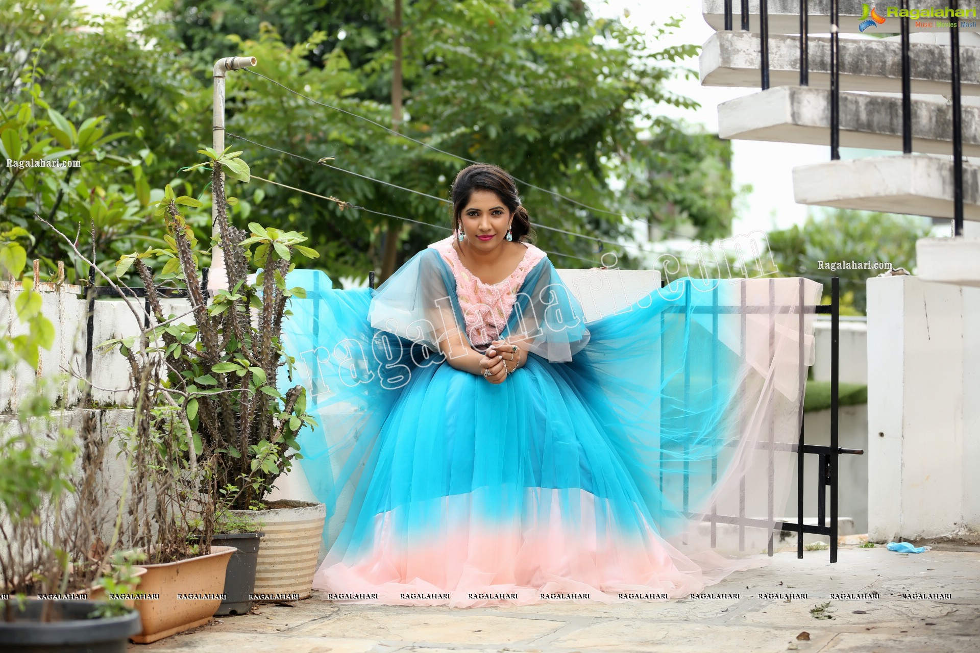 Indu in Bell Sleeves Pink Crop Top and Sky Blue Net Lehenga Exclusive Photo Shoot