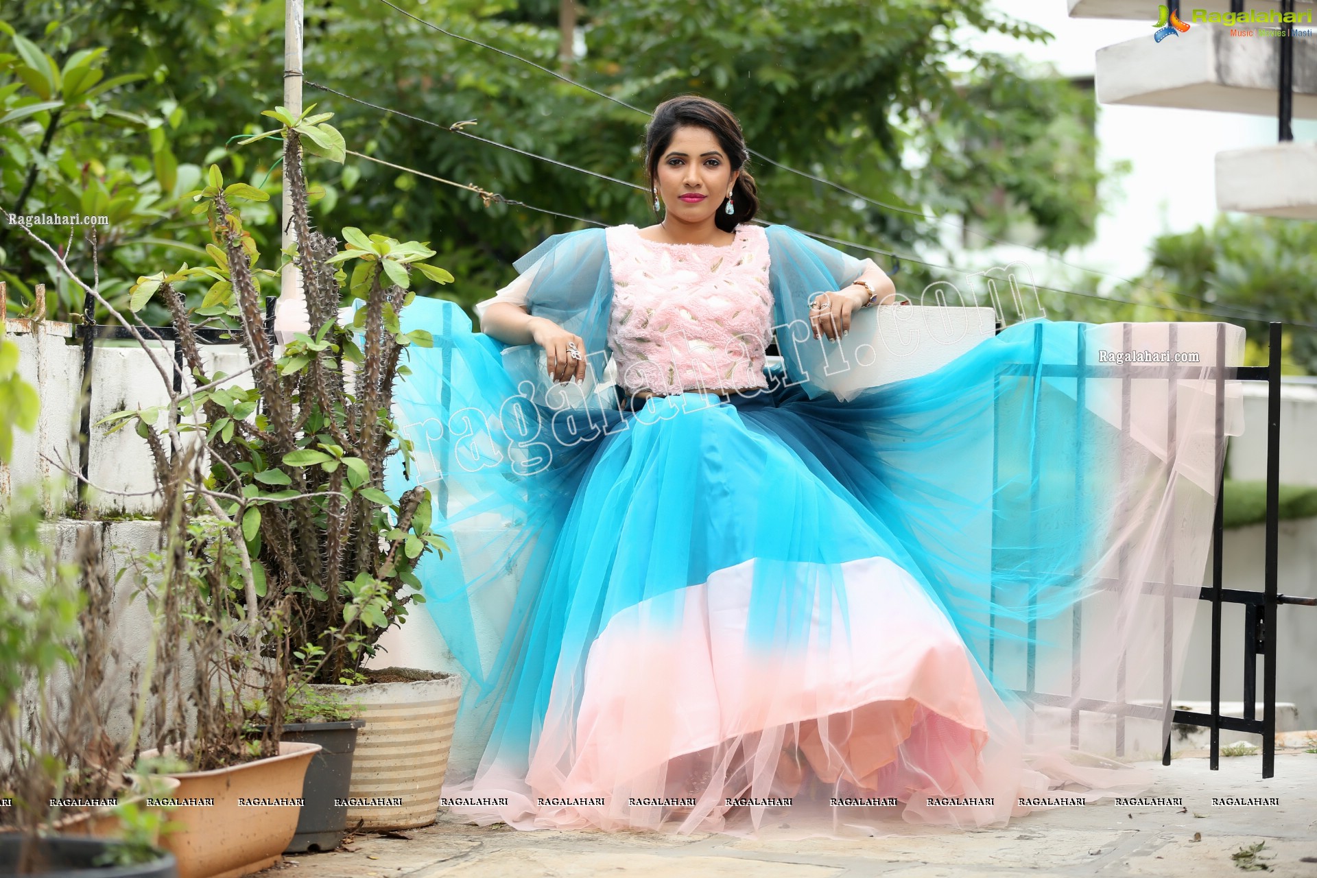 Indu in Bell Sleeves Pink Crop Top and Sky Blue Net Lehenga Exclusive Photo Shoot