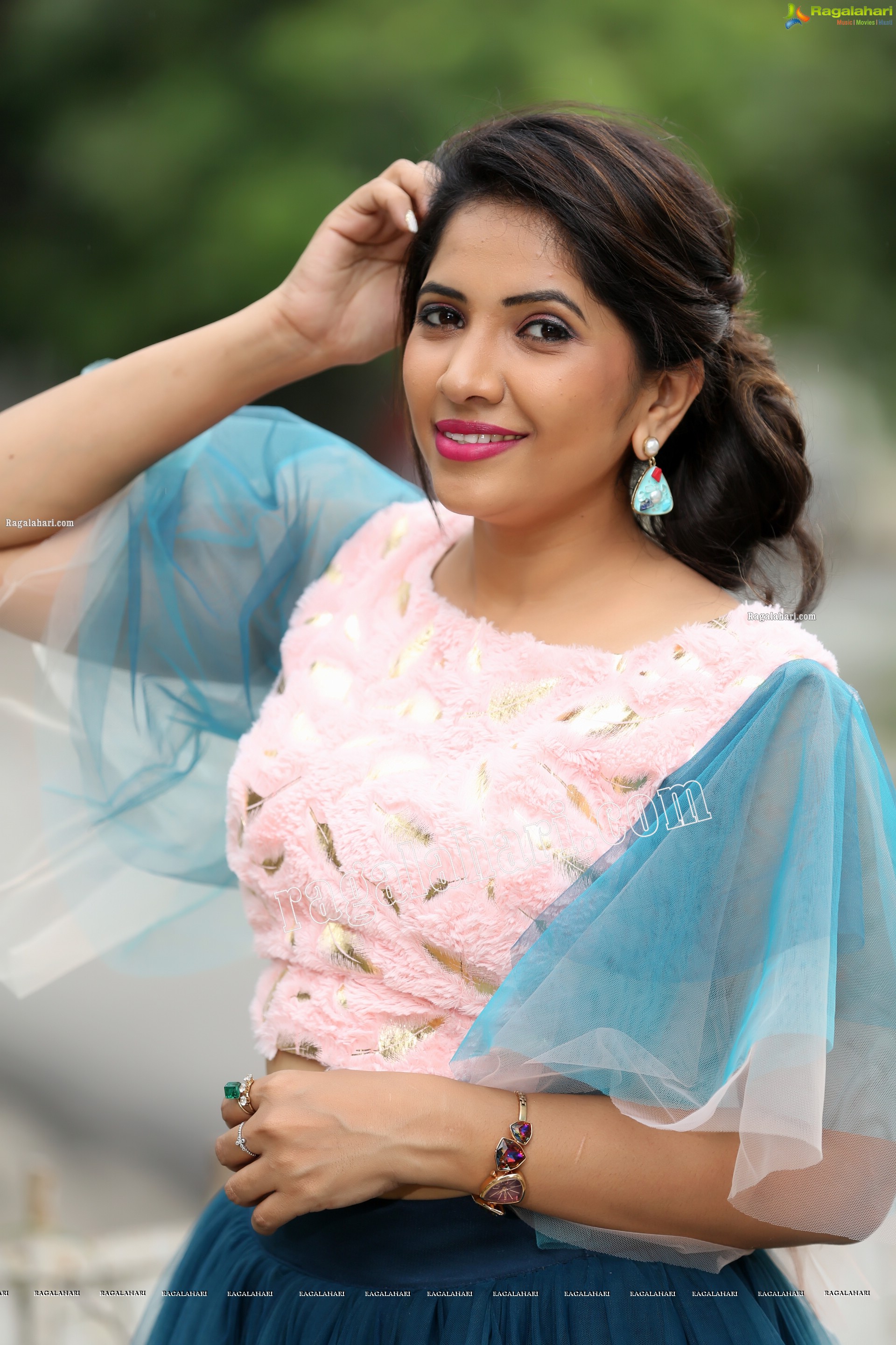 Indu in Bell Sleeves Pink Crop Top and Sky Blue Net Lehenga Exclusive Photo Shoot