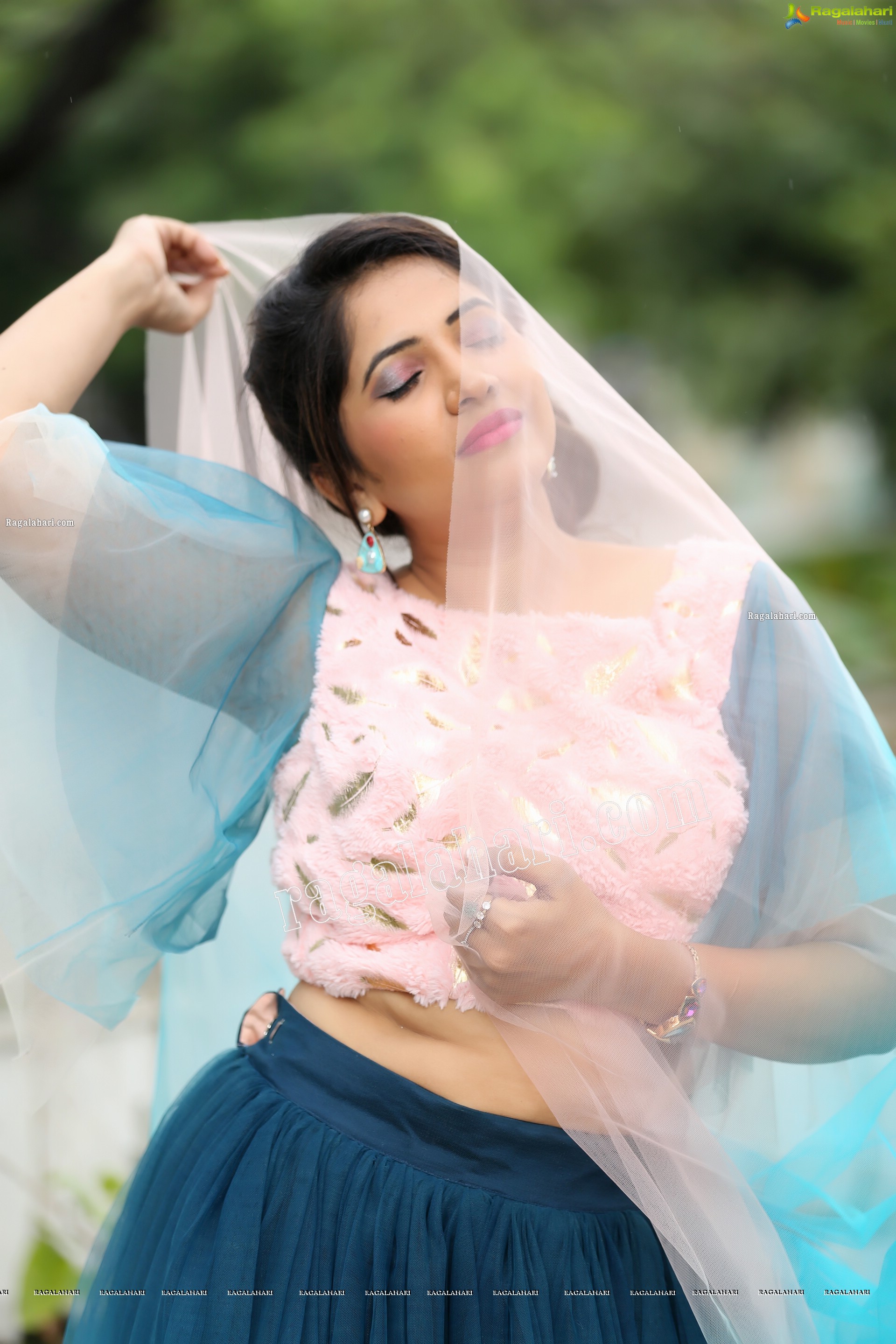 Indu in Bell Sleeves Pink Crop Top and Sky Blue Net Lehenga Exclusive Photo Shoot