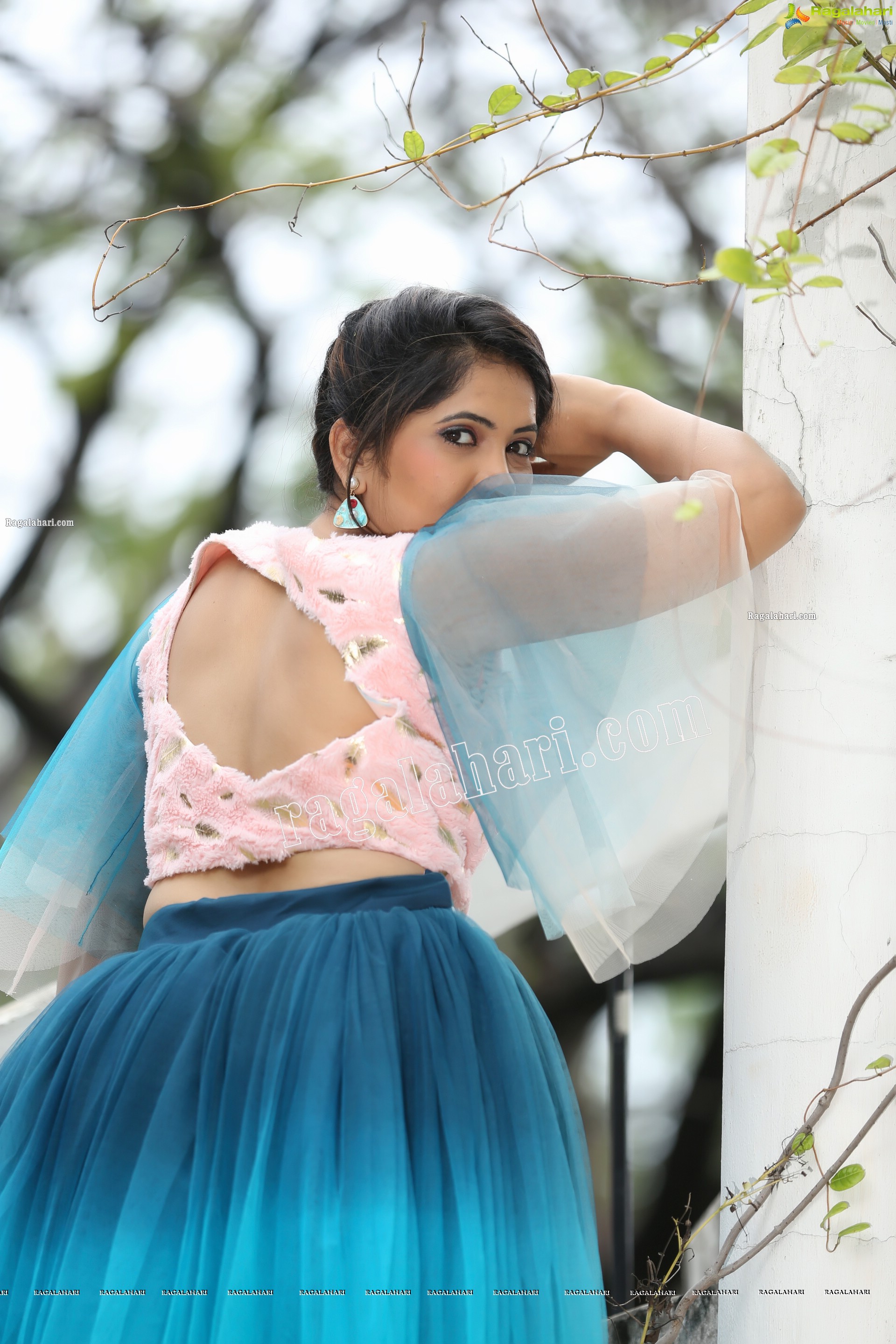 Indu in Bell Sleeves Pink Crop Top and Sky Blue Net Lehenga Exclusive Photo Shoot