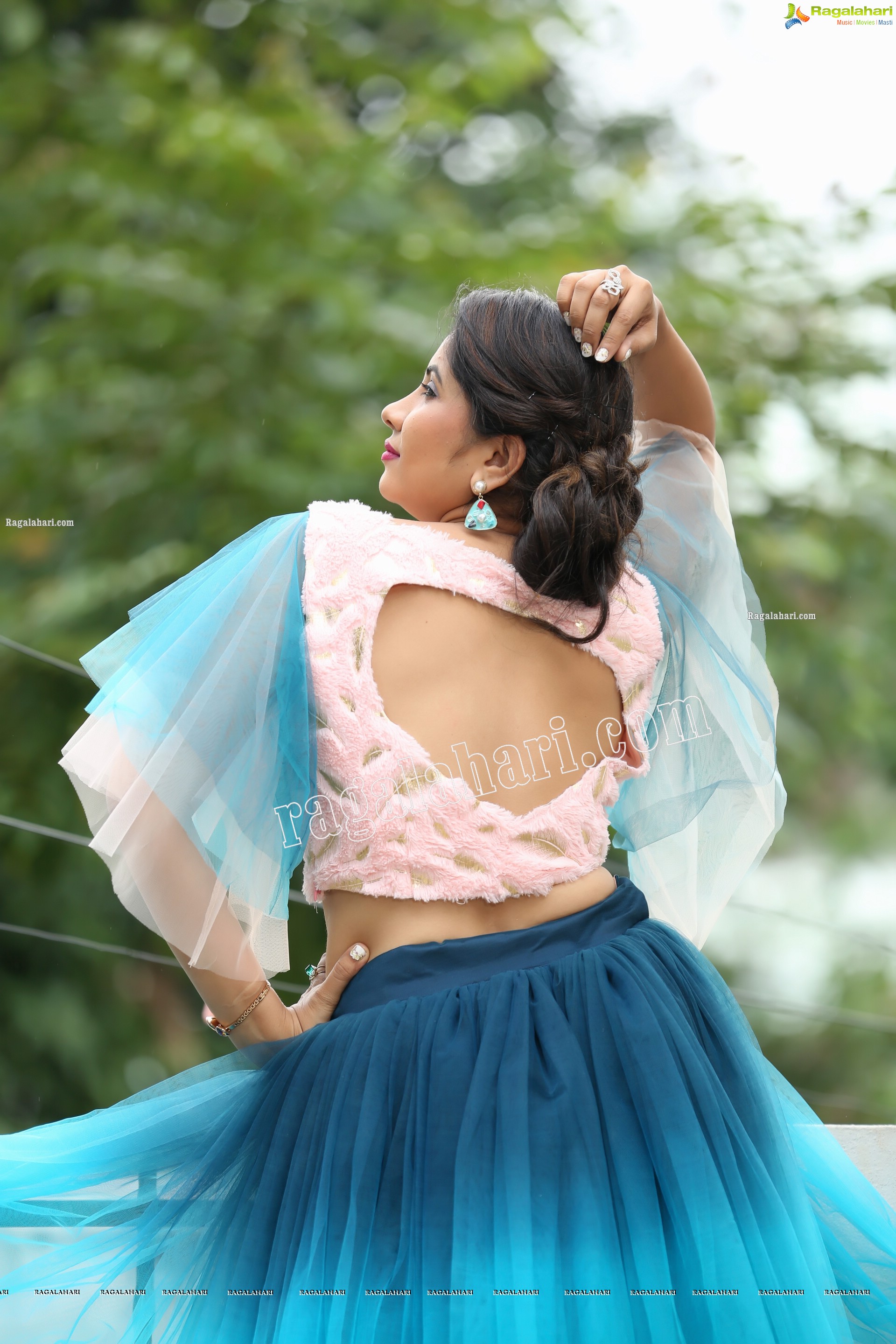 Indu in Bell Sleeves Pink Crop Top and Sky Blue Net Lehenga Exclusive Photo Shoot