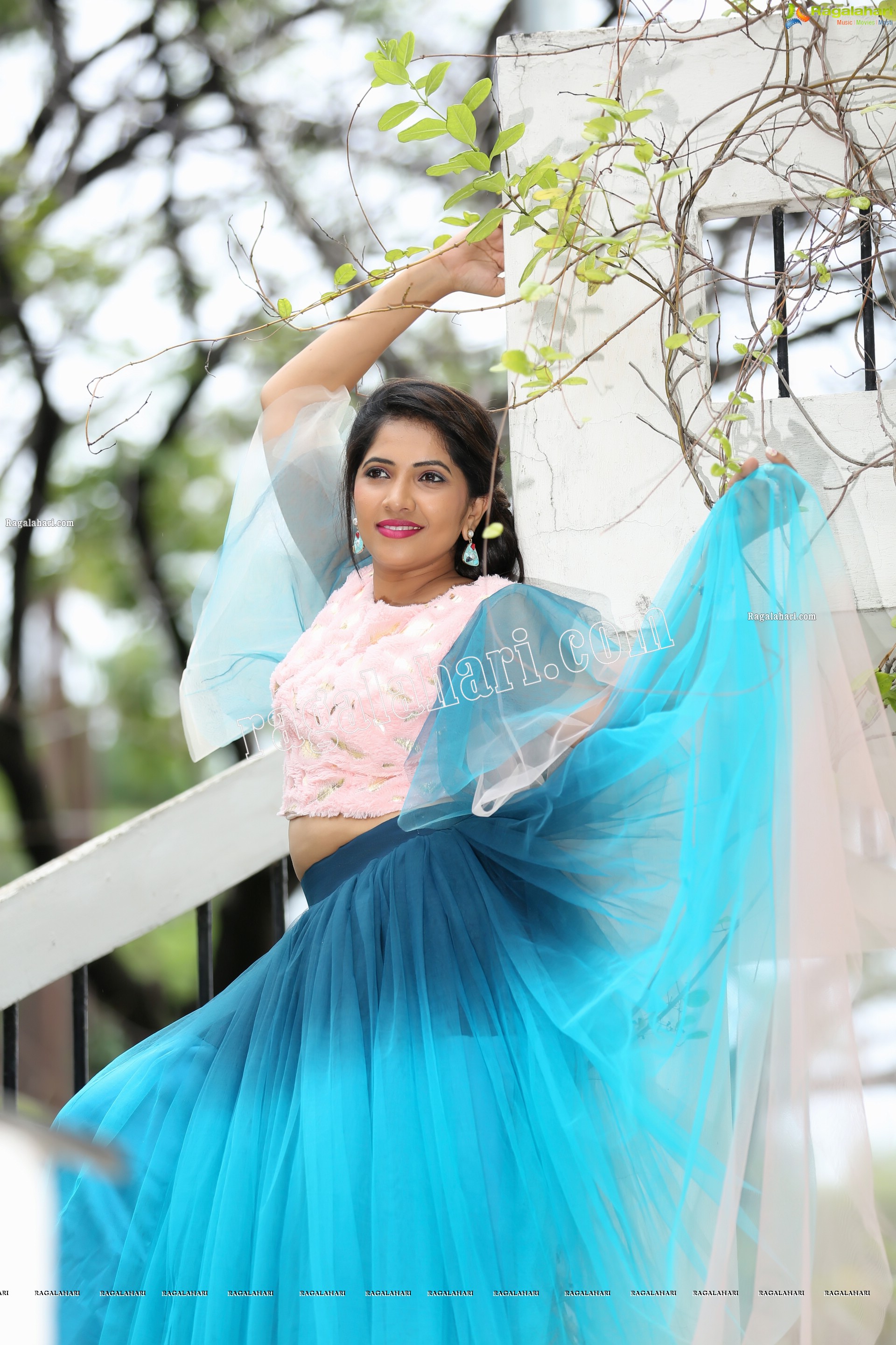 Indu in Bell Sleeves Pink Crop Top and Sky Blue Net Lehenga Exclusive Photo Shoot