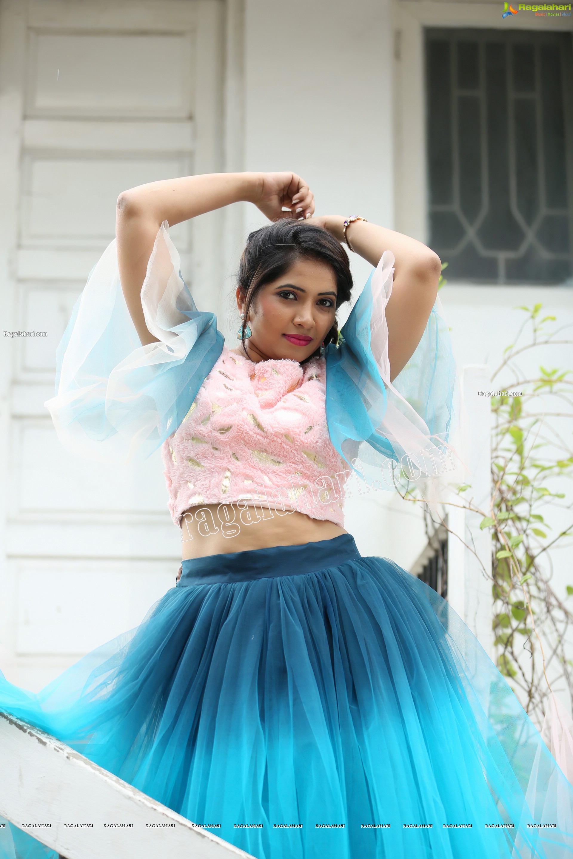 Indu in Bell Sleeves Pink Crop Top and Sky Blue Net Lehenga Exclusive Photo Shoot