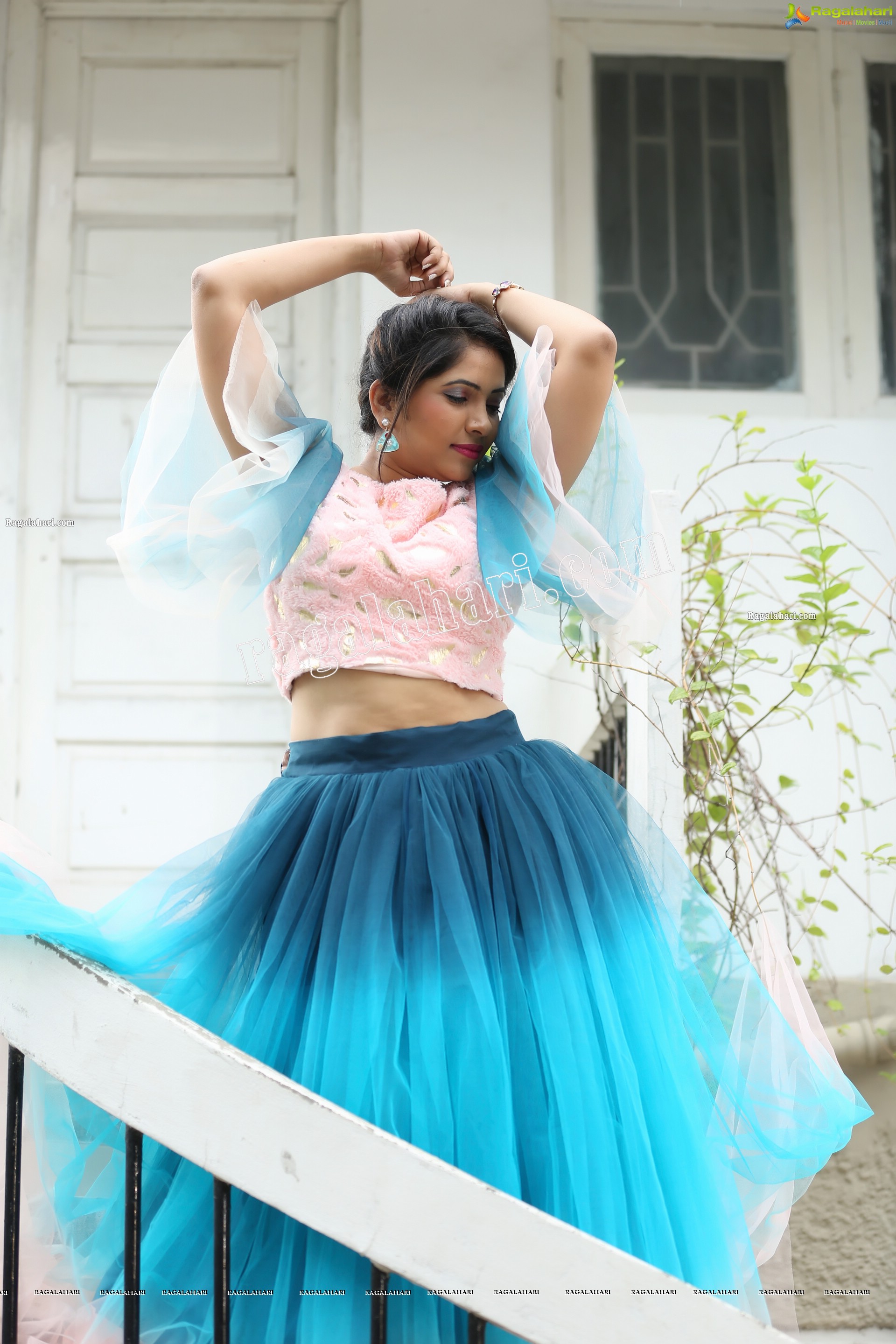 Indu in Bell Sleeves Pink Crop Top and Sky Blue Net Lehenga Exclusive Photo Shoot