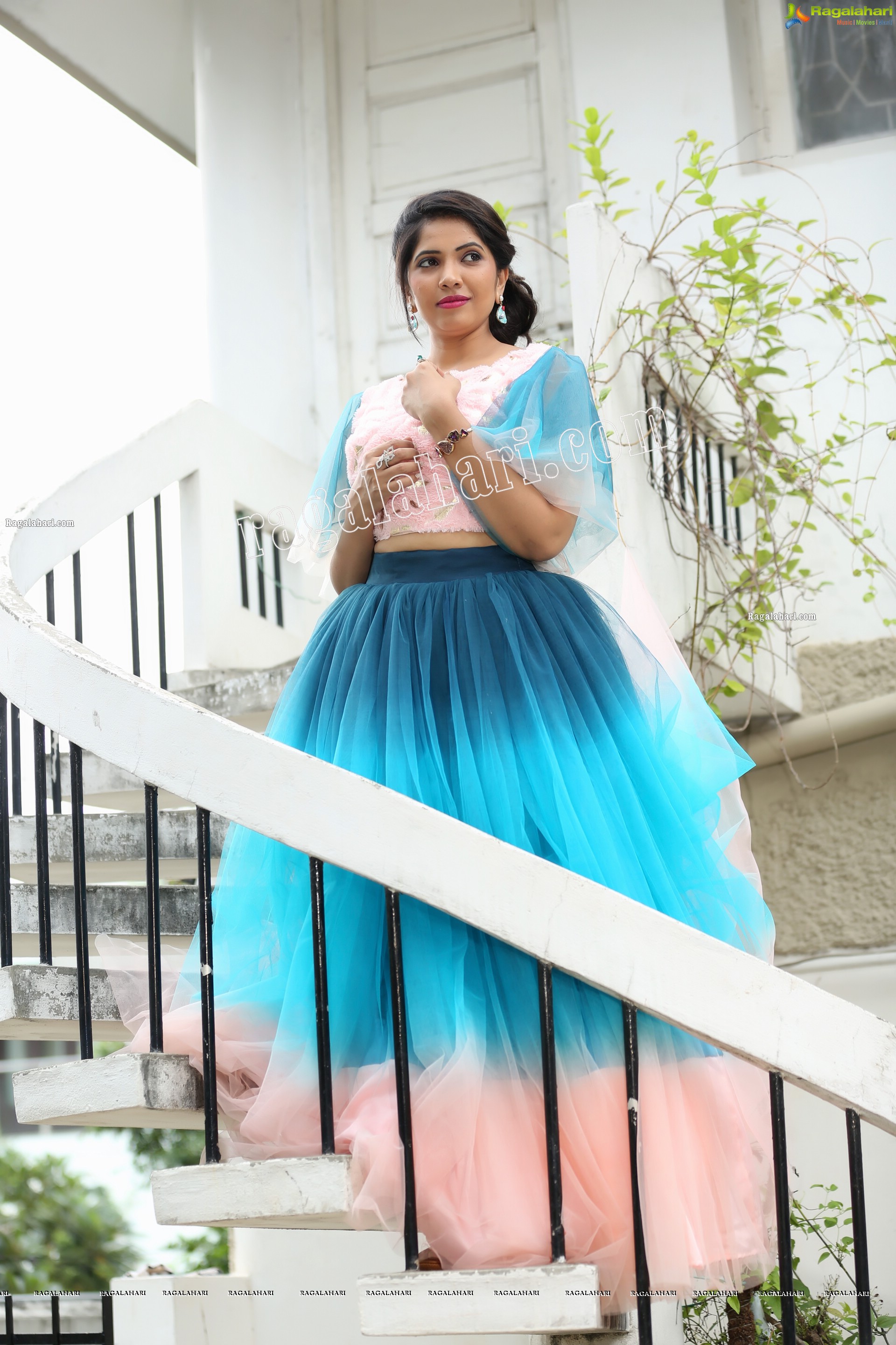 Indu in Bell Sleeves Pink Crop Top and Sky Blue Net Lehenga Exclusive Photo Shoot