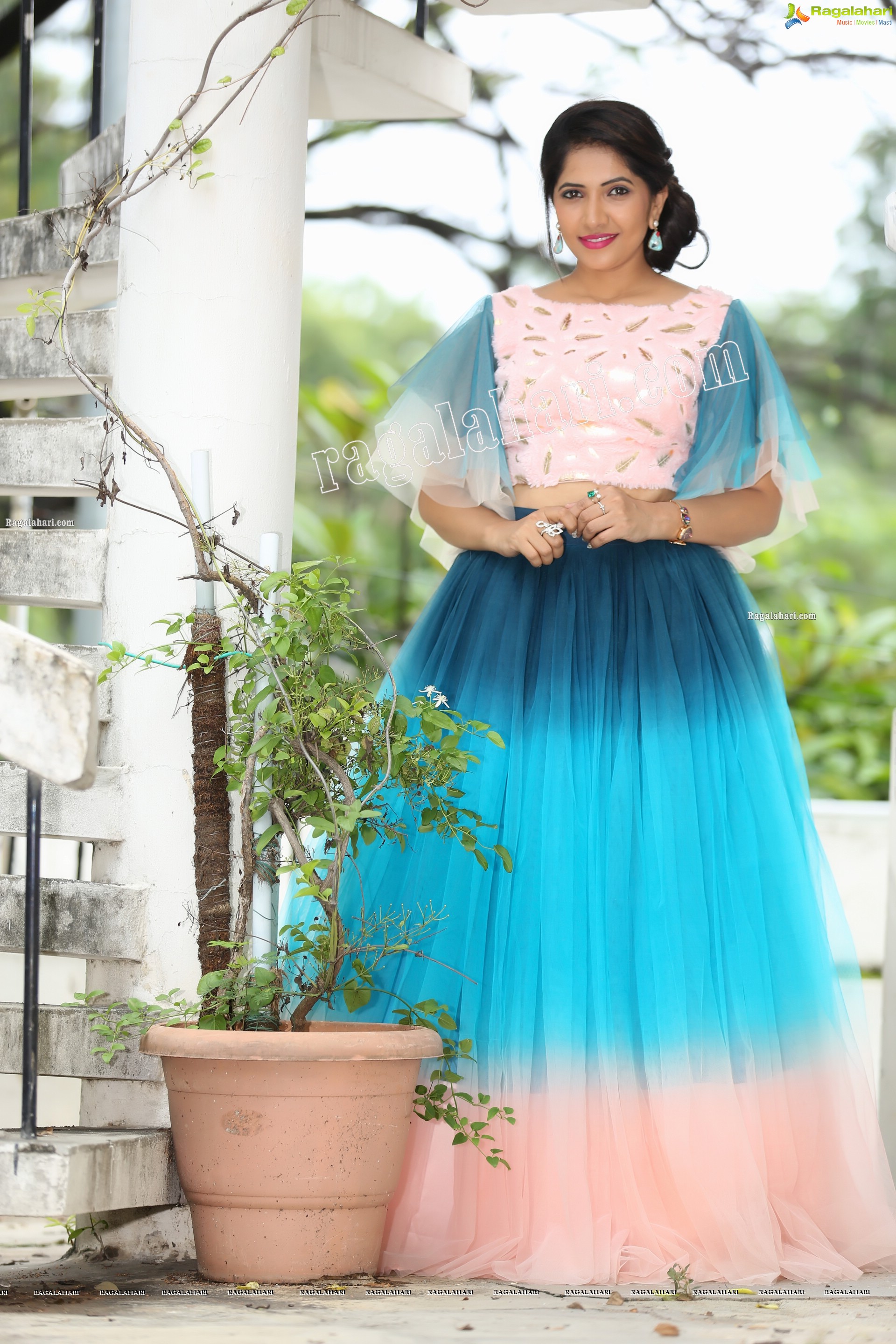 Indu in Bell Sleeves Pink Crop Top and Sky Blue Net Lehenga Exclusive Photo Shoot