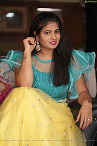 Anusha in Yellow Lehenga and Blue Crop Top