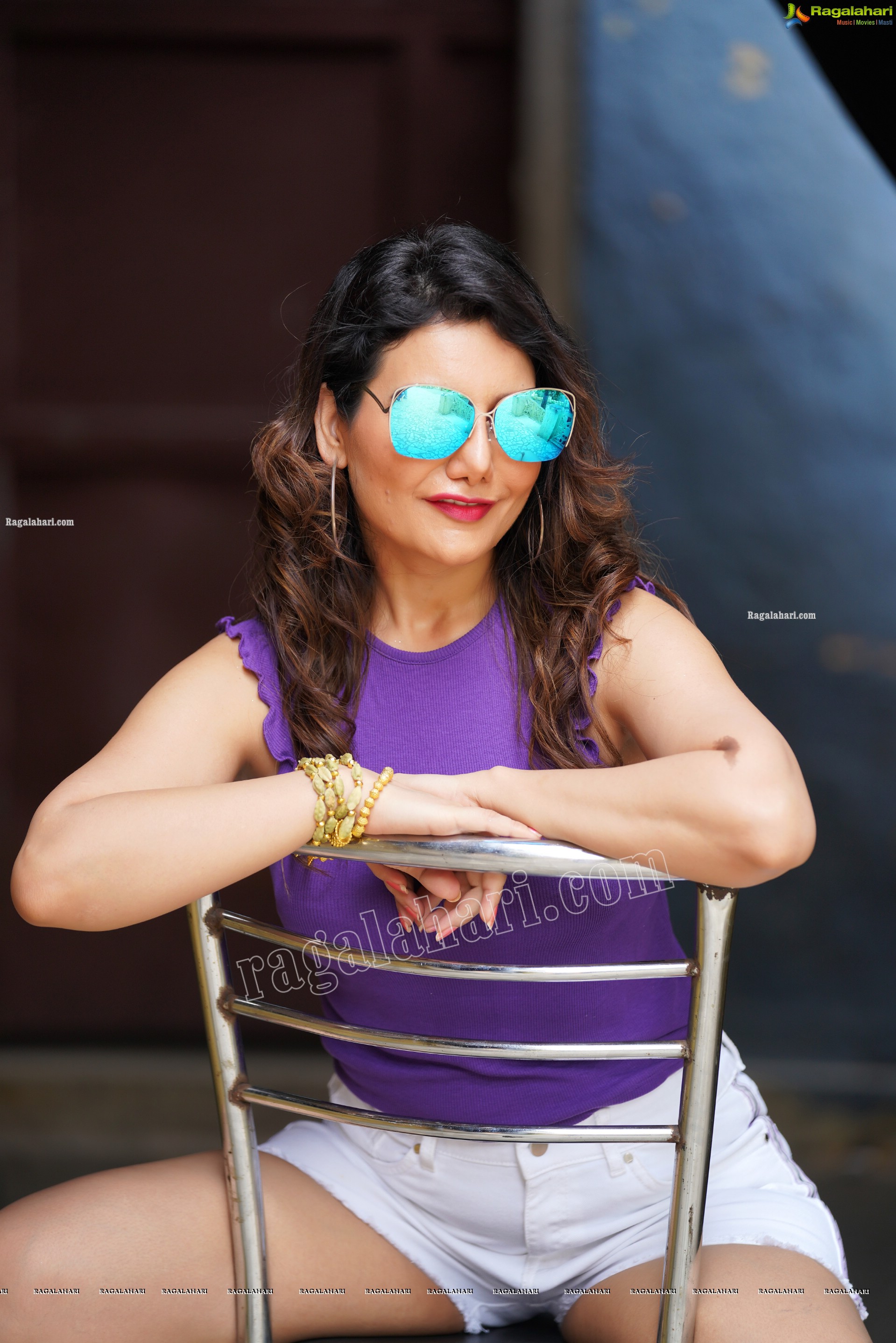 Nisha Singh Rajput in Purple Crop Top and White Shorts, Exclusive Photoshoot