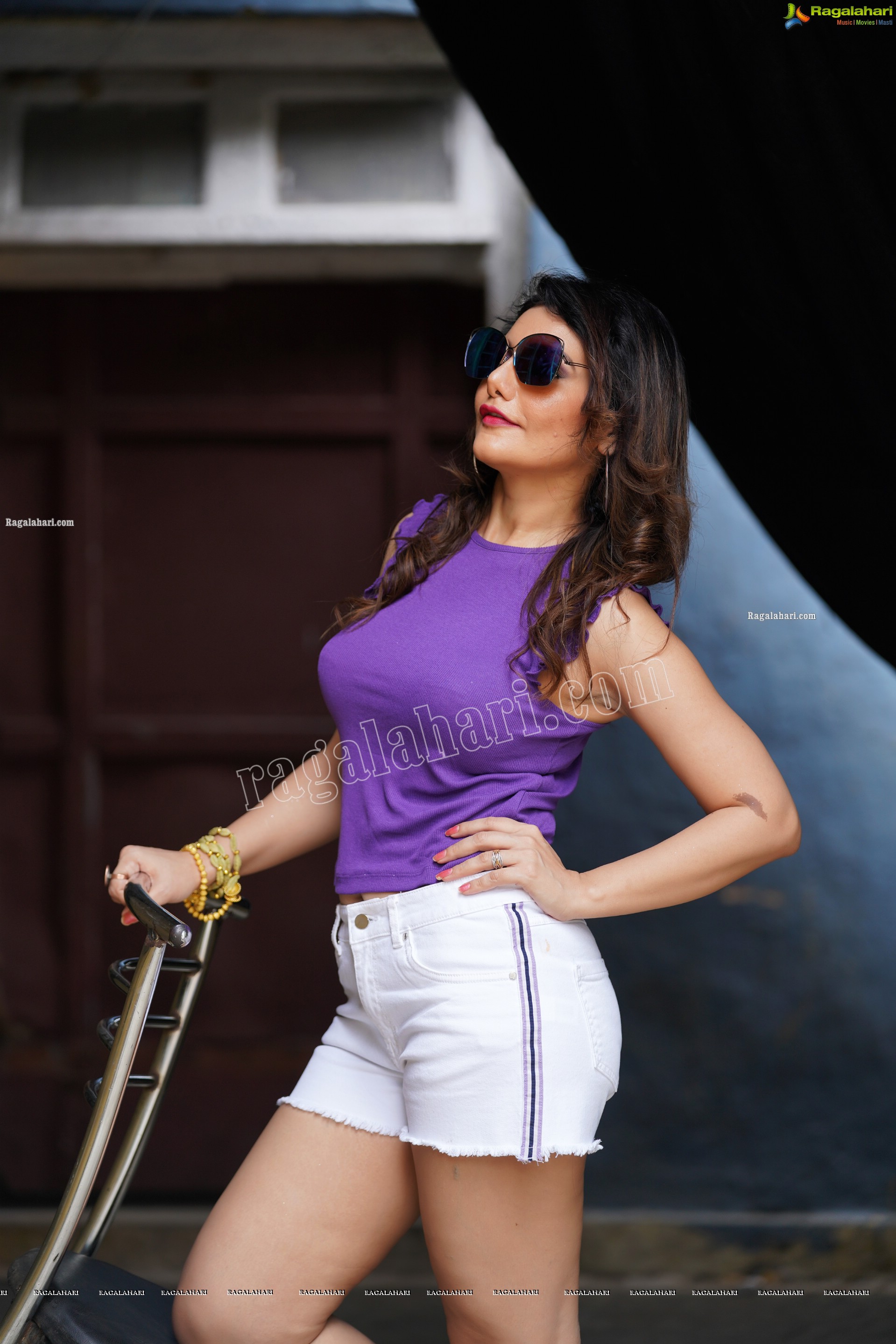 Nisha Singh Rajput in Purple Crop Top and White Shorts, Exclusive Photoshoot