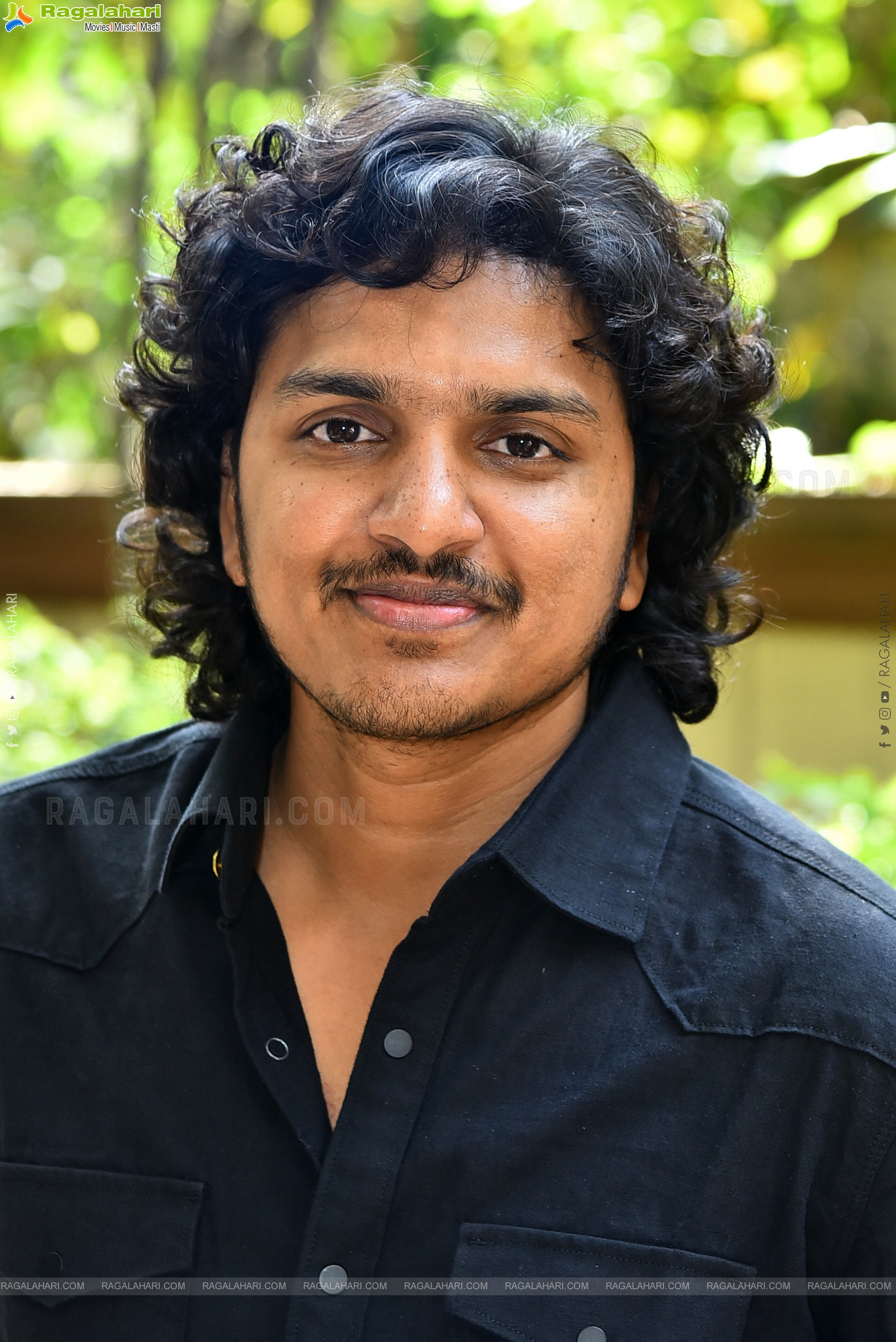 Director Mahesh Babu P at Andhra King Taluka Interview, HD Gallery