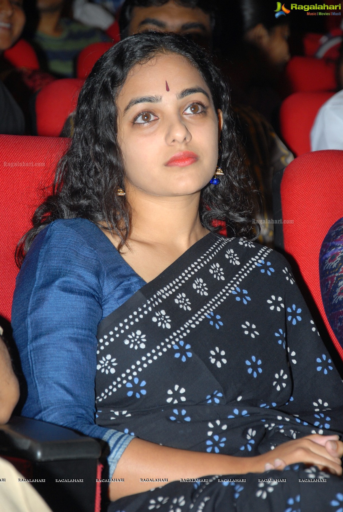 Beautiful Nithya Menen at Okkadine Audio Release Function - Photo Gallery