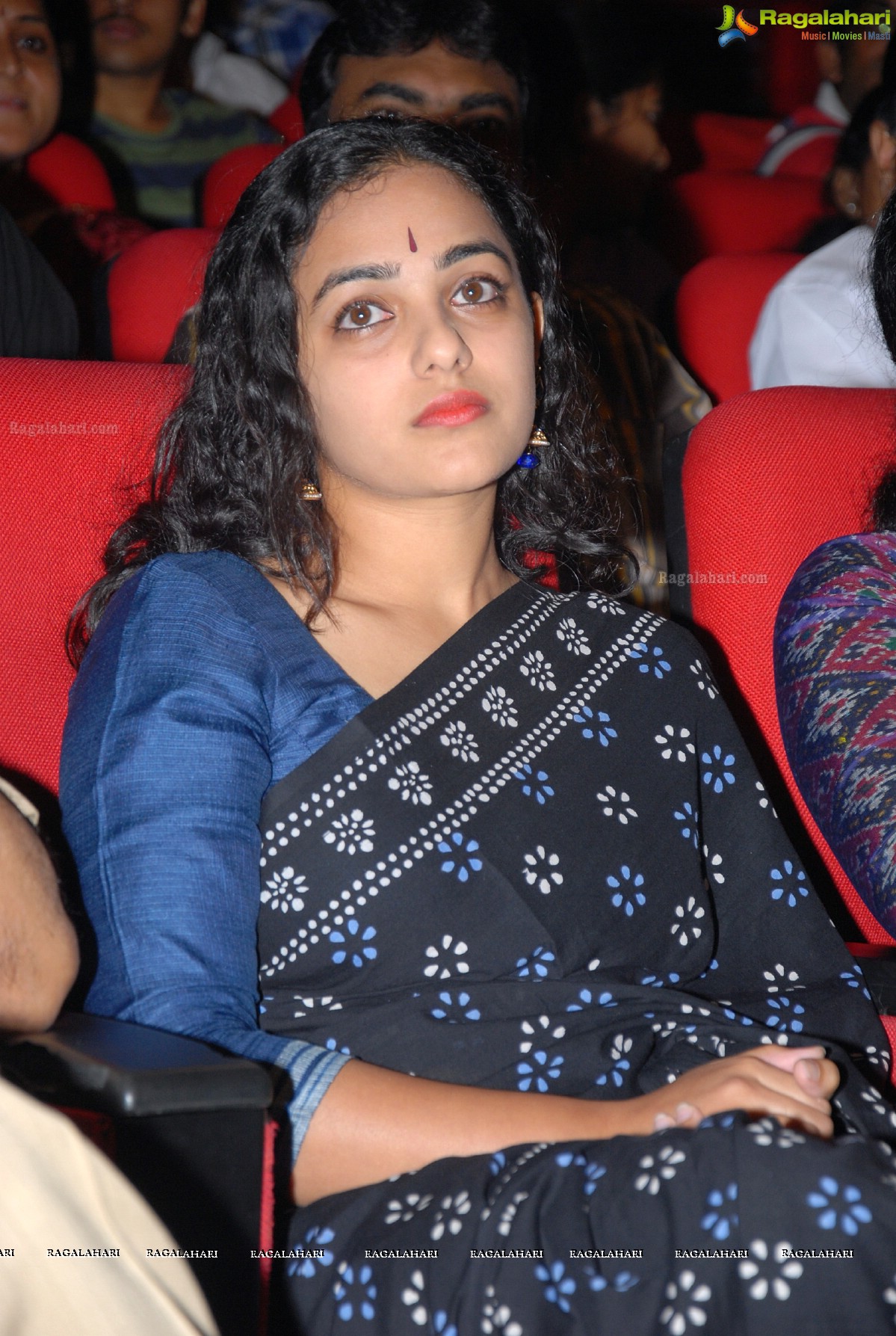 Beautiful Nithya Menen at Okkadine Audio Release Function - Photo Gallery