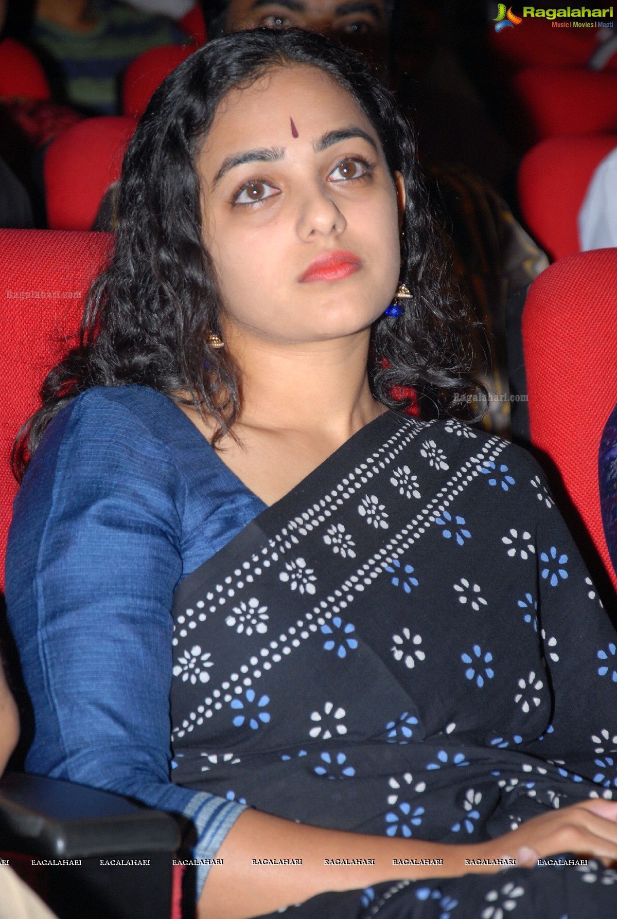 Beautiful Nithya Menen at Okkadine Audio Release Function - Photo Gallery