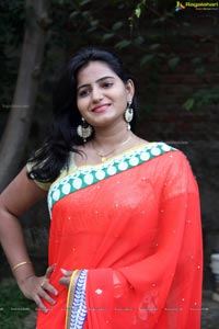 Heroine Tanusha in Red Saree