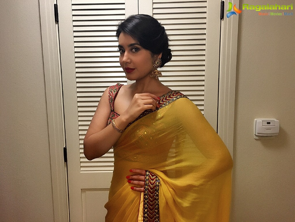 Raashi Khanna in Sleeveless Yellow Saree Photos