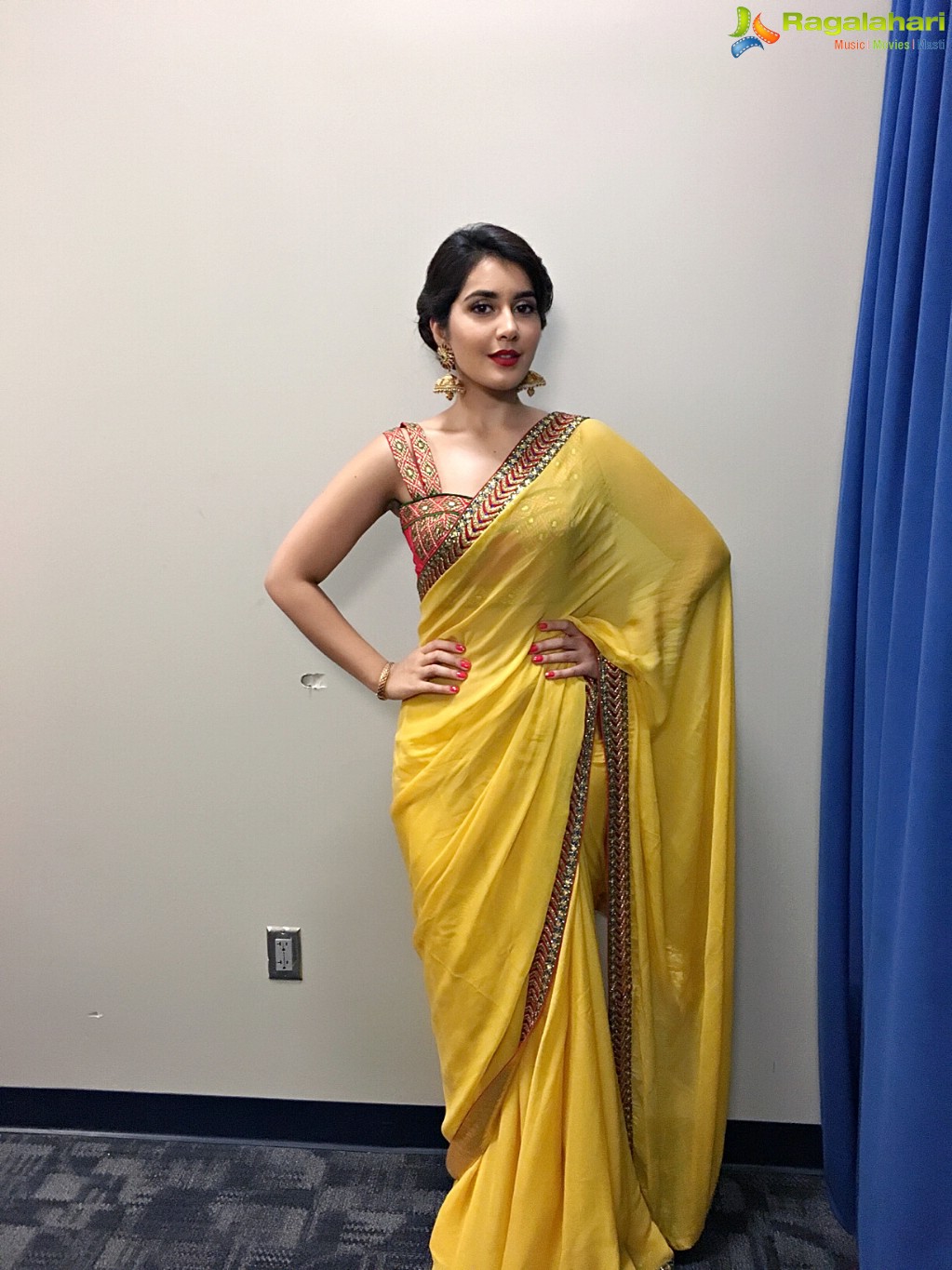 Raashi Khanna in Sleeveless Yellow Saree Photos